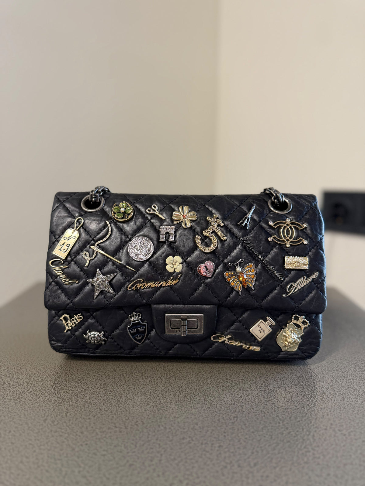 Chanel Black Quilted Charm Flap Bag