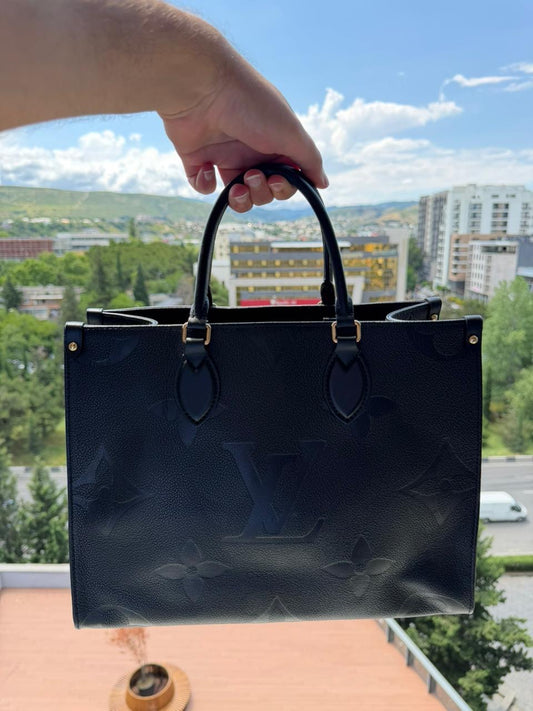 Louis Vuitton OnTheGo MM Monogram Empreinte Leather Noir Tote Bag Women