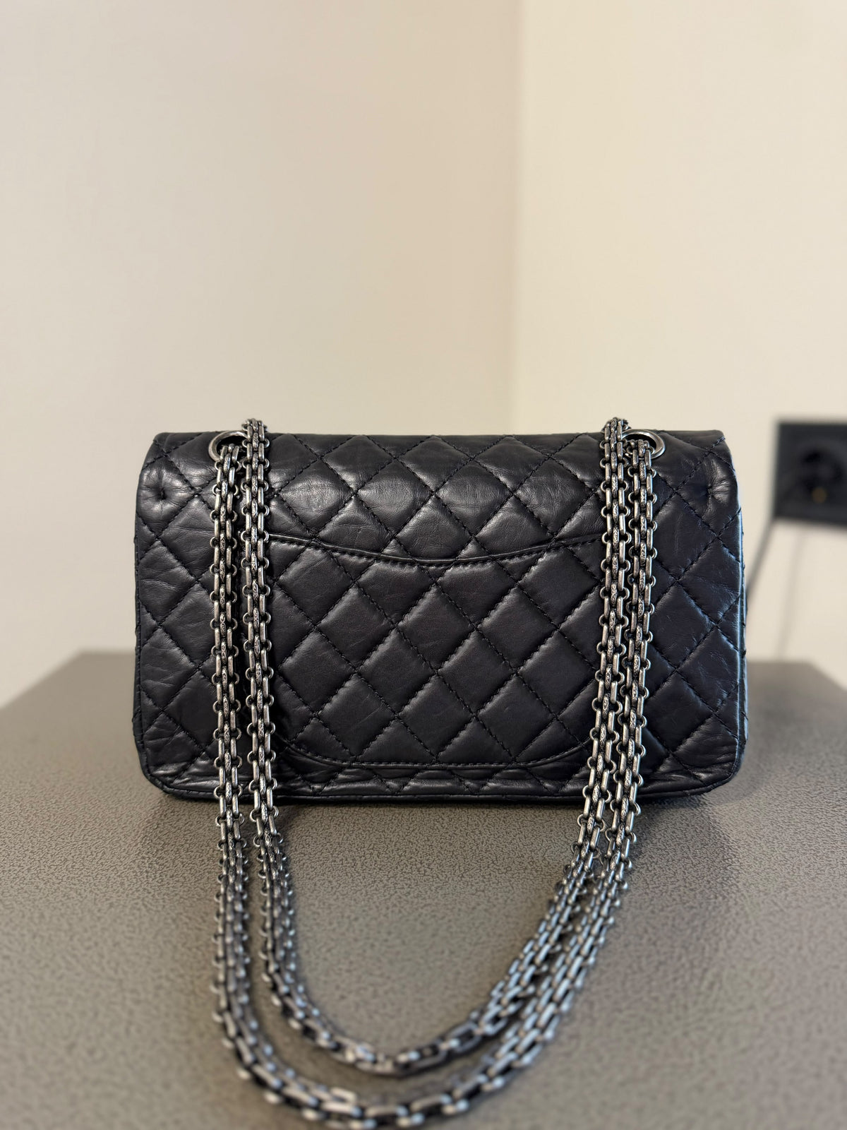 Chanel Black Quilted Charm Flap Bag