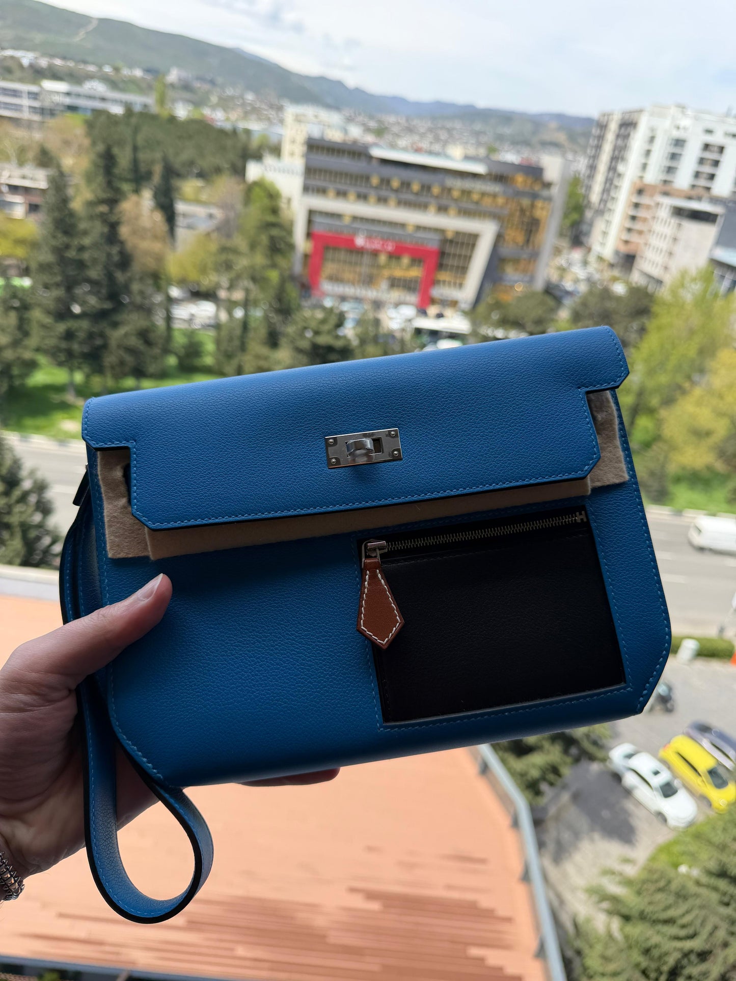 Hermes Depeche Colormatic Bleu Hydra/Black/Fauve Evercolor PHW. New, with box and documents.