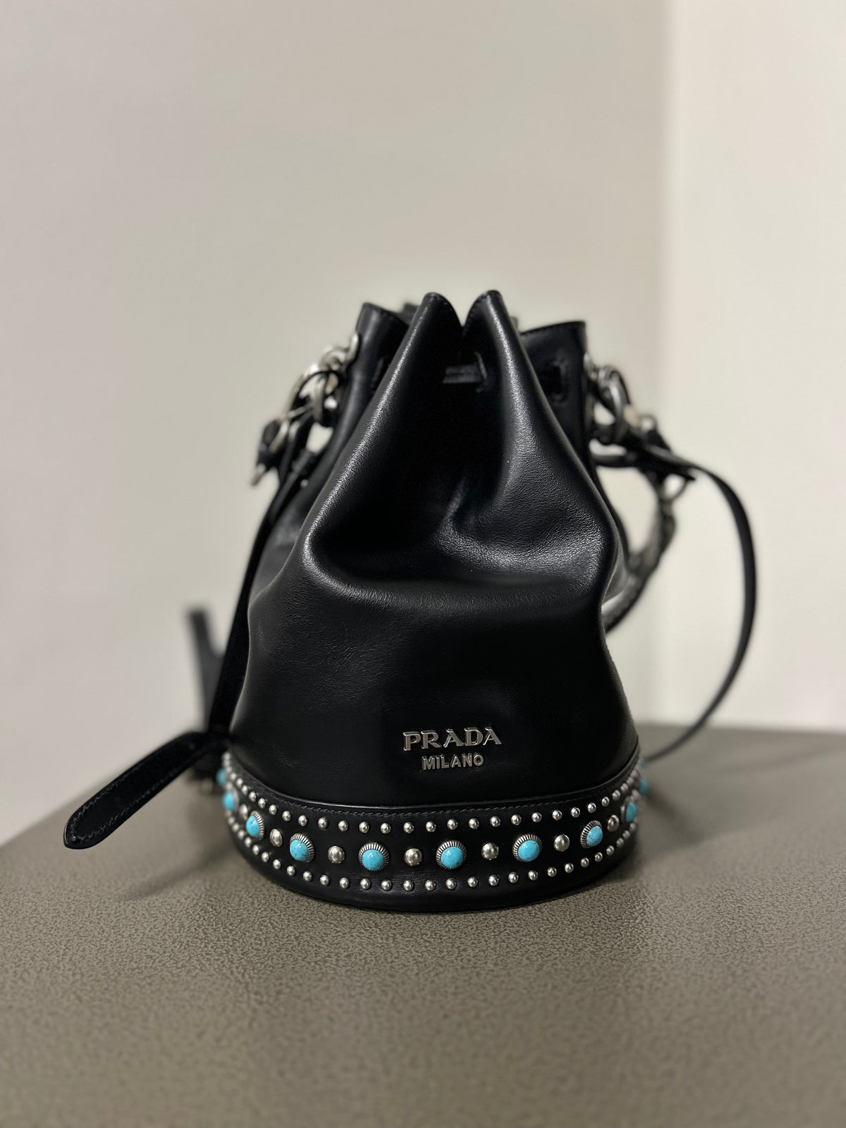 Prada Black Leather Bucket Bag with Turquoise Studs