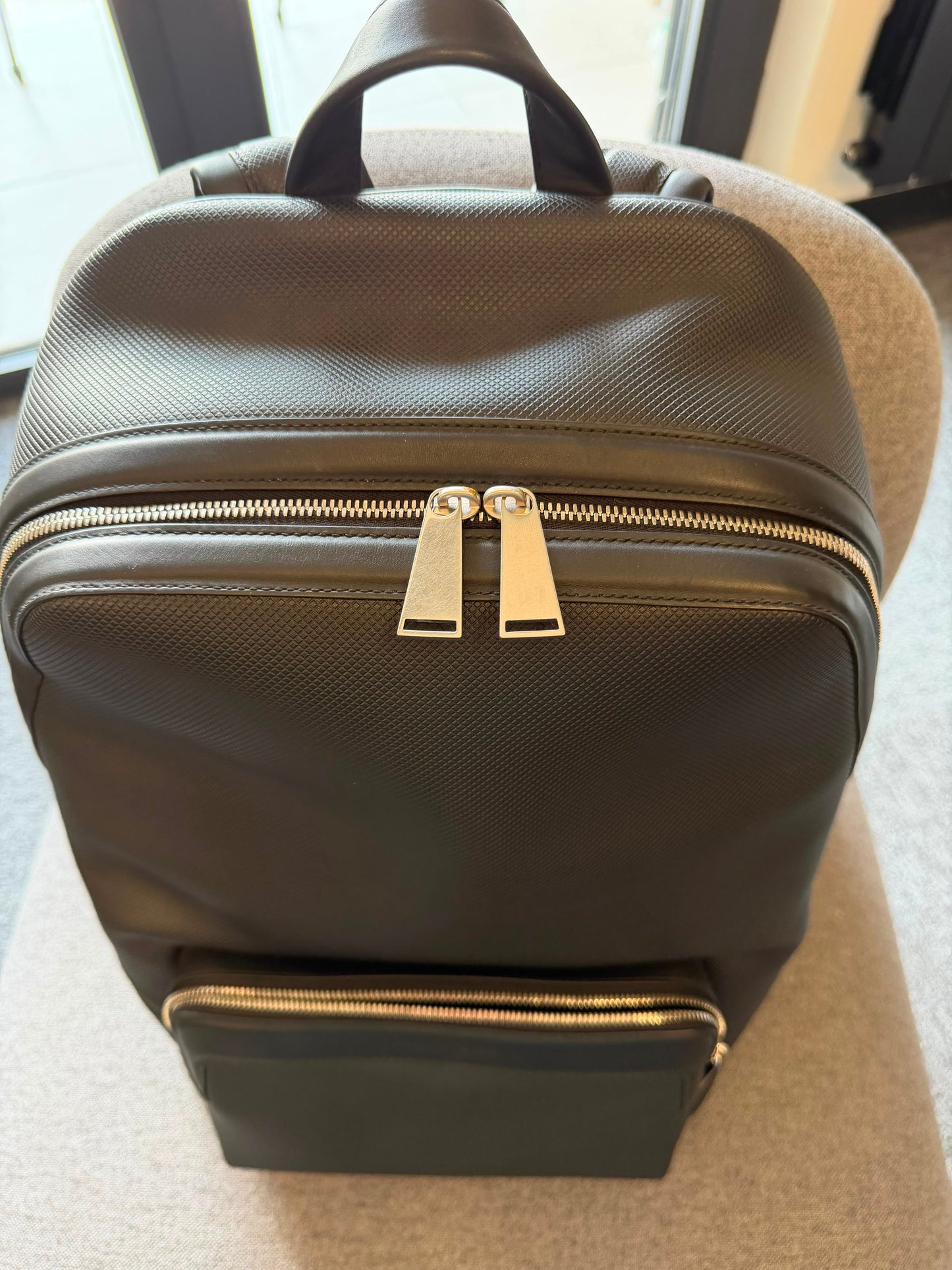 Bottega Veneta Marco Polo Backpack In Black Diamond-Textured Calfskin Leather With Silver-Tone Hardware