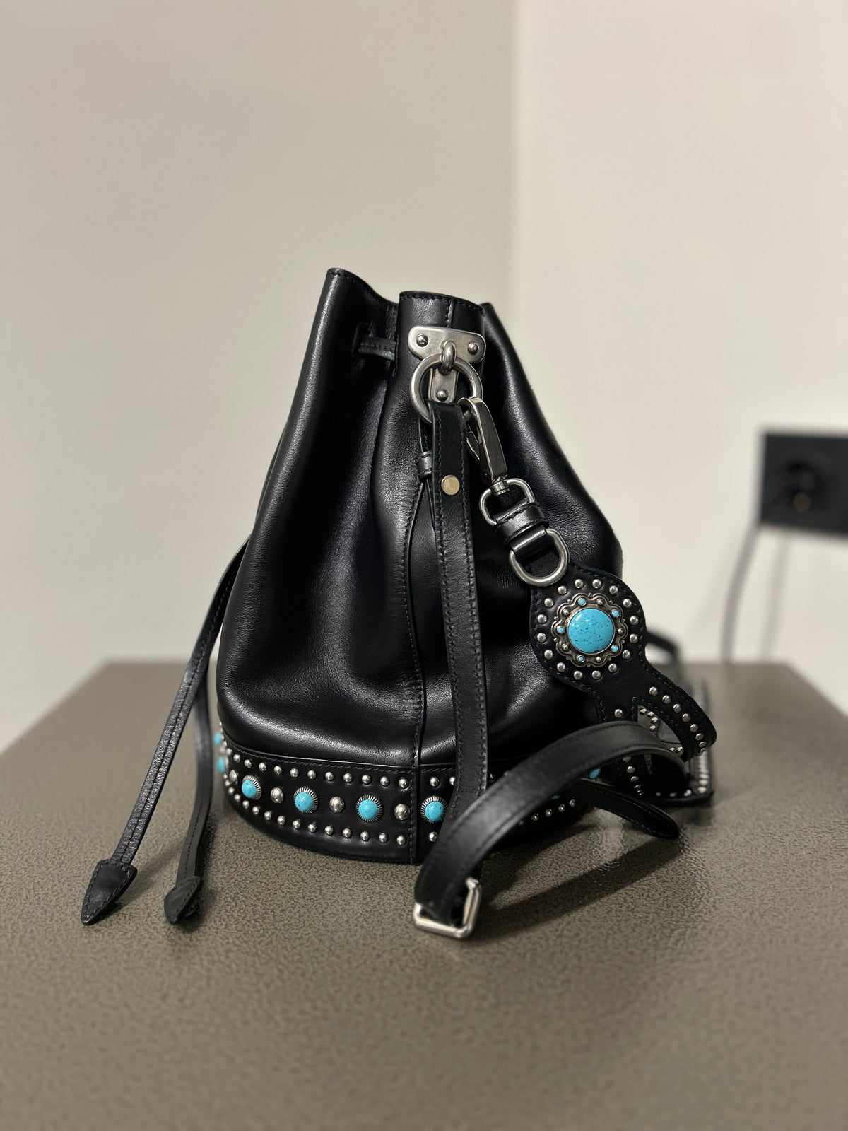 Prada Black Leather Bucket Bag with Turquoise Studs